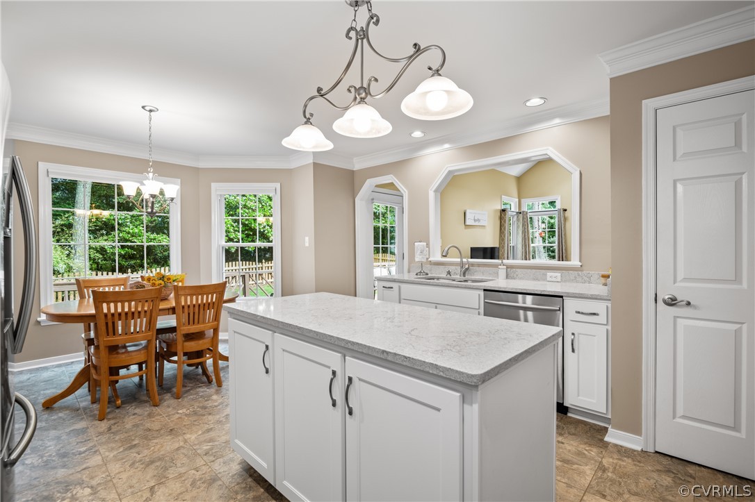 5303 Meadow Chase Road Midlothian, VA 23112 - Photo 16 of 49 a view of a dining room with furniture and a chandelier