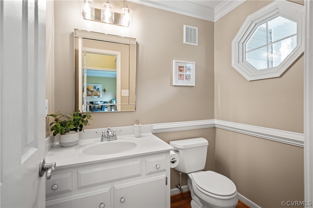 5303 Meadow Chase Road Midlothian, VA 23112 - Photo 26 of 49 a bathroom with a sink mirror vanity and toilet