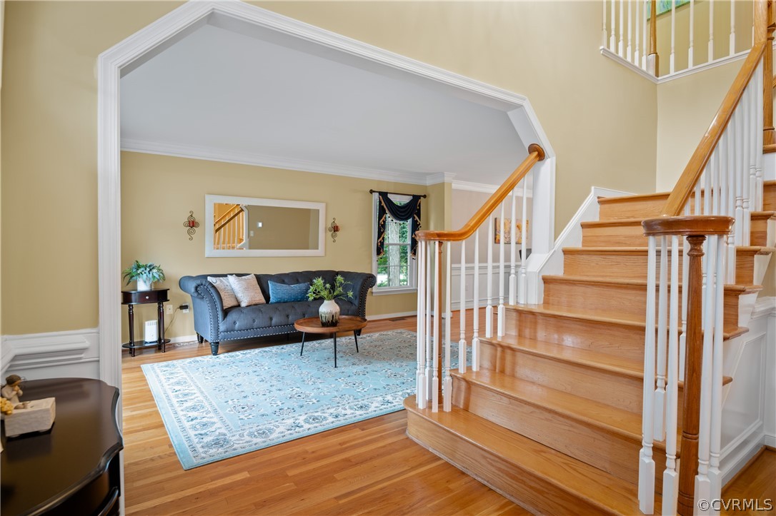 5303 Meadow Chase Road Midlothian, VA 23112 - Photo 3 of 49 a view of entryway bedroom and hall with wooden floor