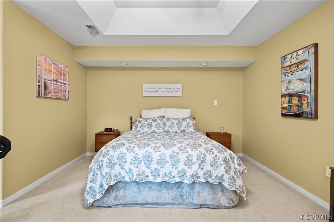 5303 Meadow Chase Road Midlothian, VA 23112 - Photo 32 of 49 a large bed sitting in a bedroom next to a wall