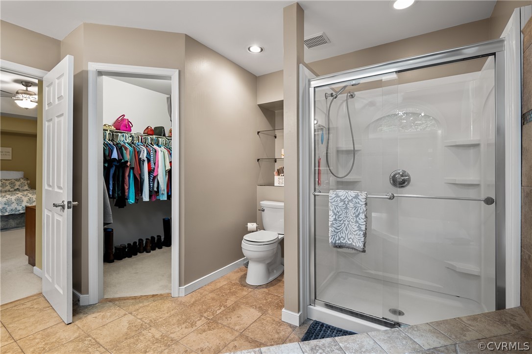 5303 Meadow Chase Road Midlothian, VA 23112 - Photo 37 of 49 a bathroom with a shower and a toilet