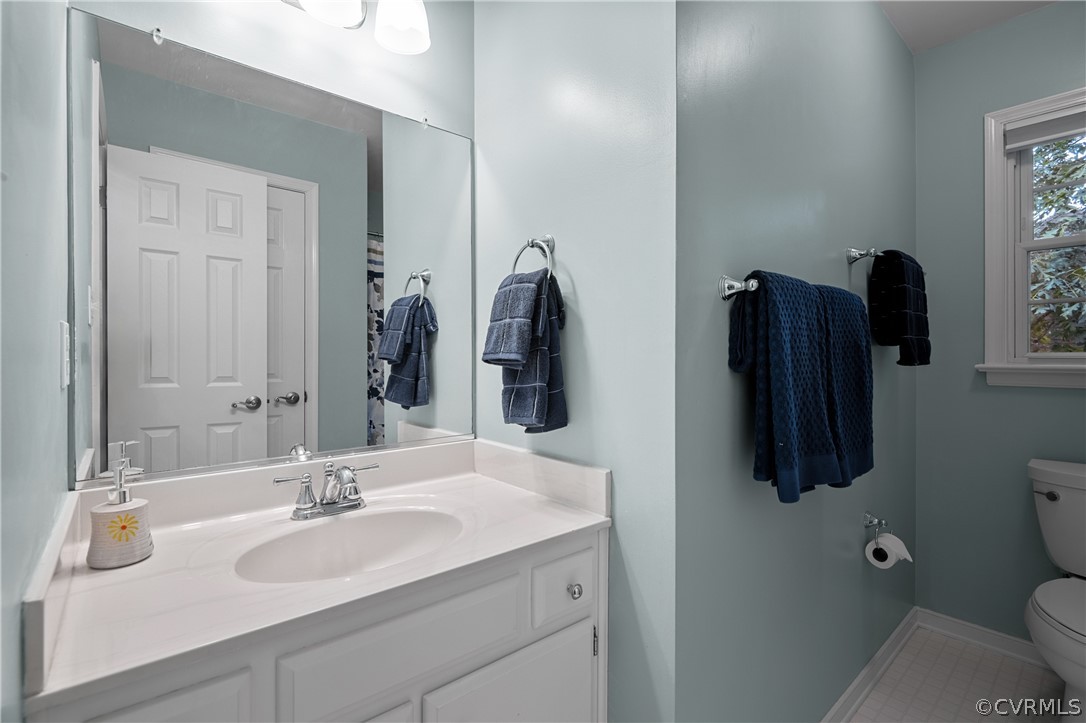 5303 Meadow Chase Road Midlothian, VA 23112 - Photo 40 of 49 a bathroom with a sink vanity and mirror