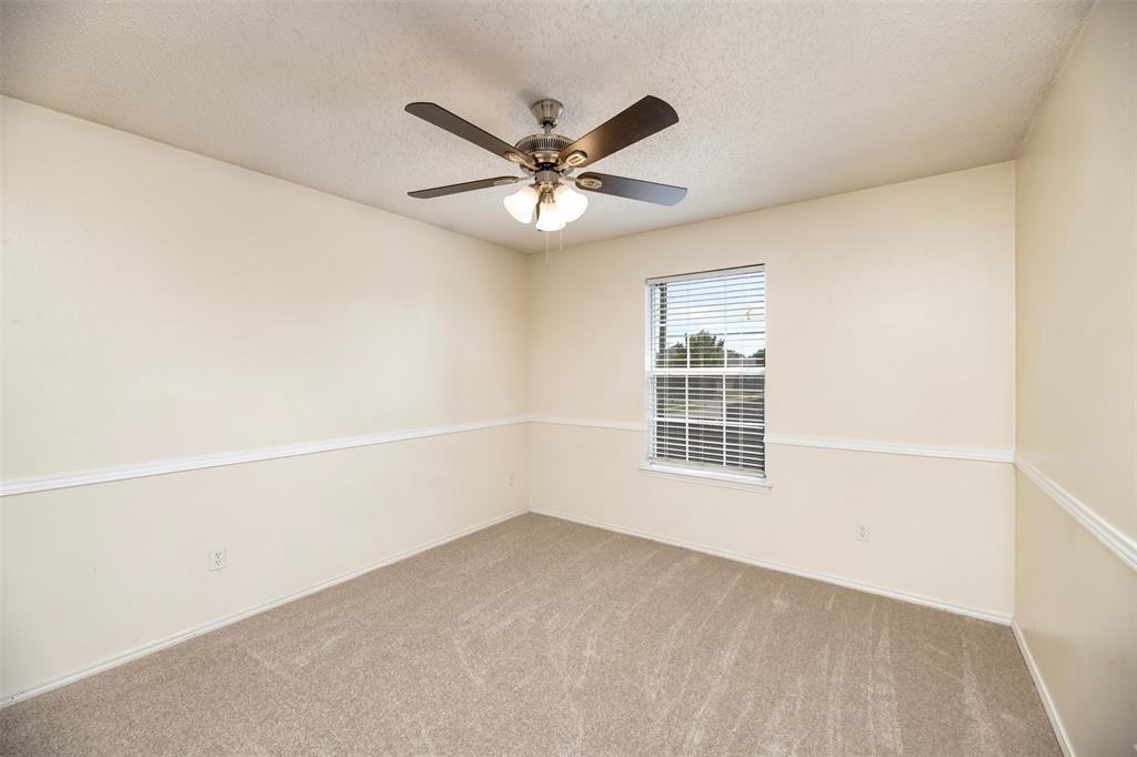 1410 Brookside Drive Allen, TX 75002 - Photo 24 of 38 a view of an empty room with a window