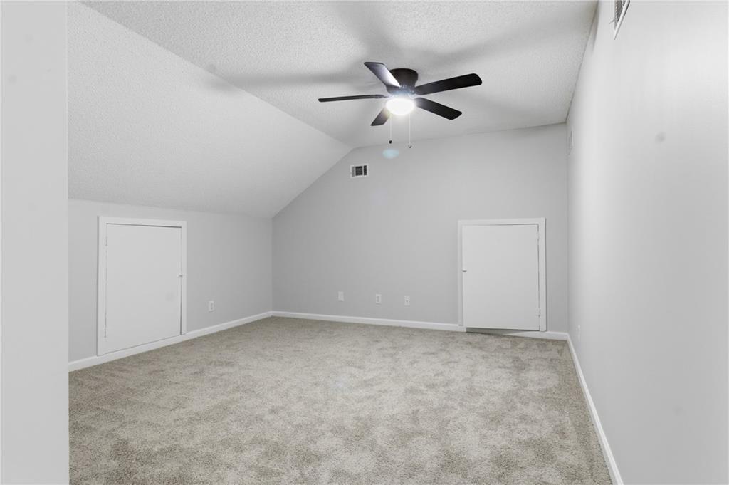 2110 Meadow View Court Grayson, GA 30017 - Photo 38 of 50 a view of an empty room