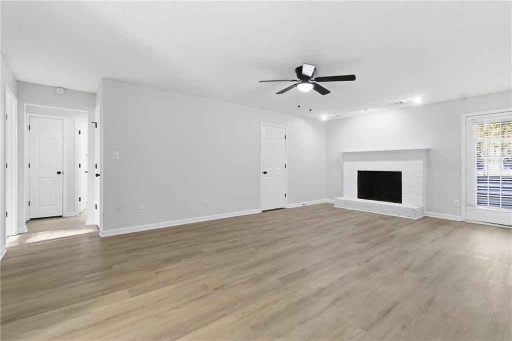 2110 Meadow View Court Grayson, GA 30017 - Photo 10 of 50 an empty room with fan and windows