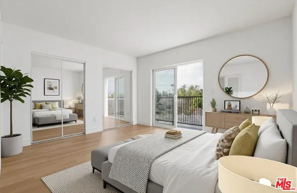 a kitchen with a stove a sink and a refrigerator