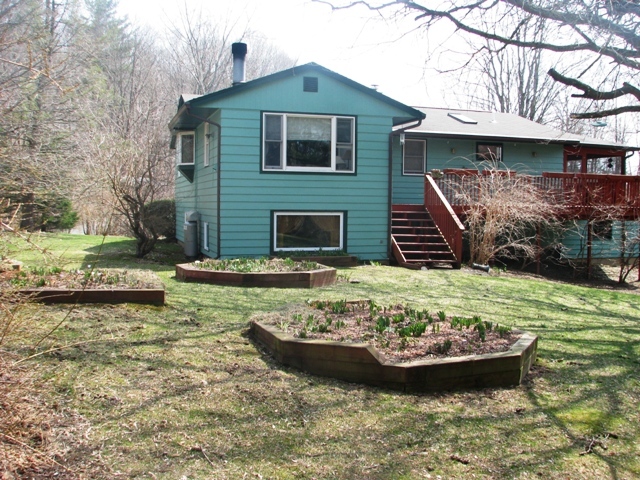 47 Lenox Road West Stockbridge, MA 01266 - Photo 3 of 25 a view of a house with swimming pool