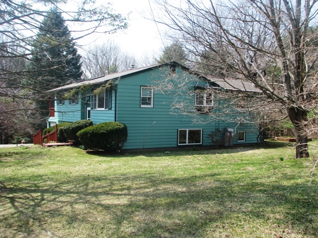 47 Lenox Road West Stockbridge, MA 01266 - Photo 4 of 25 a view of a house with a yard