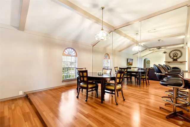 a kitchen with a stove a sink and a refrigerator