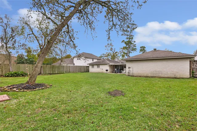 a view of a house with a back yard