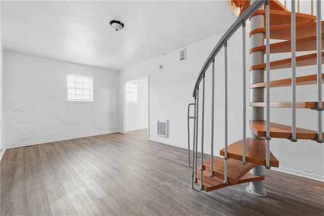 a view of livingroom with furniture and wooden floor