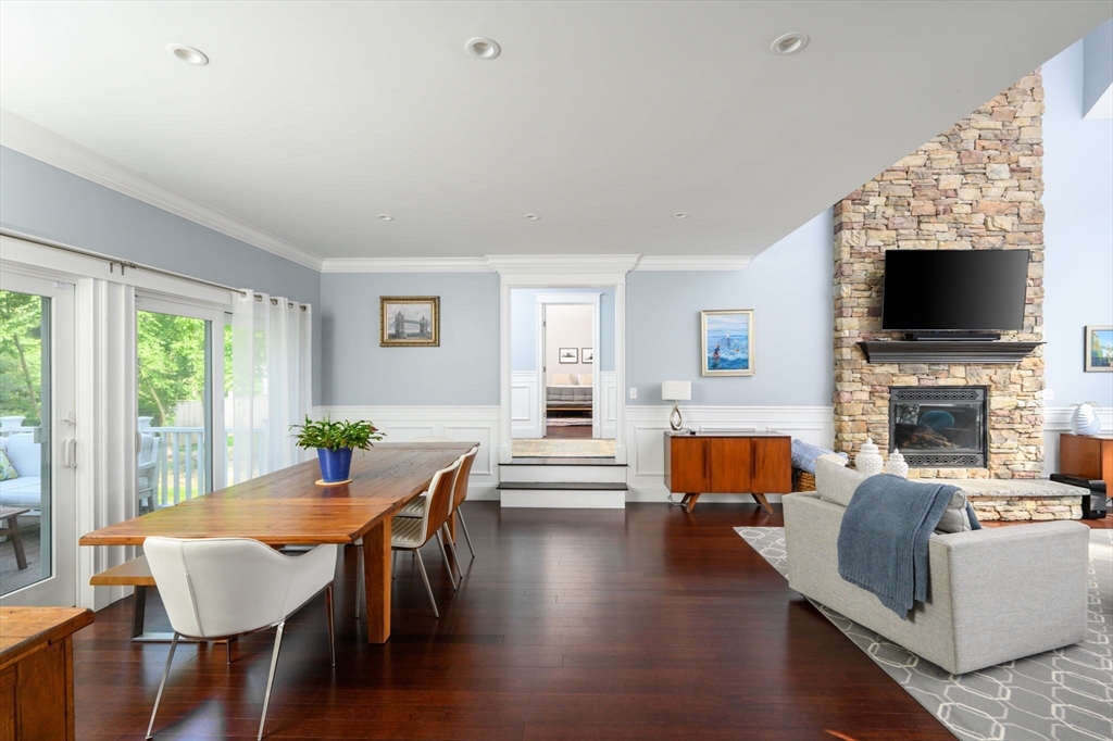 75 Popes Lane Hingham, MA 02043 - Photo 14 of 42 a living room with fireplace furniture and a flat screen tv