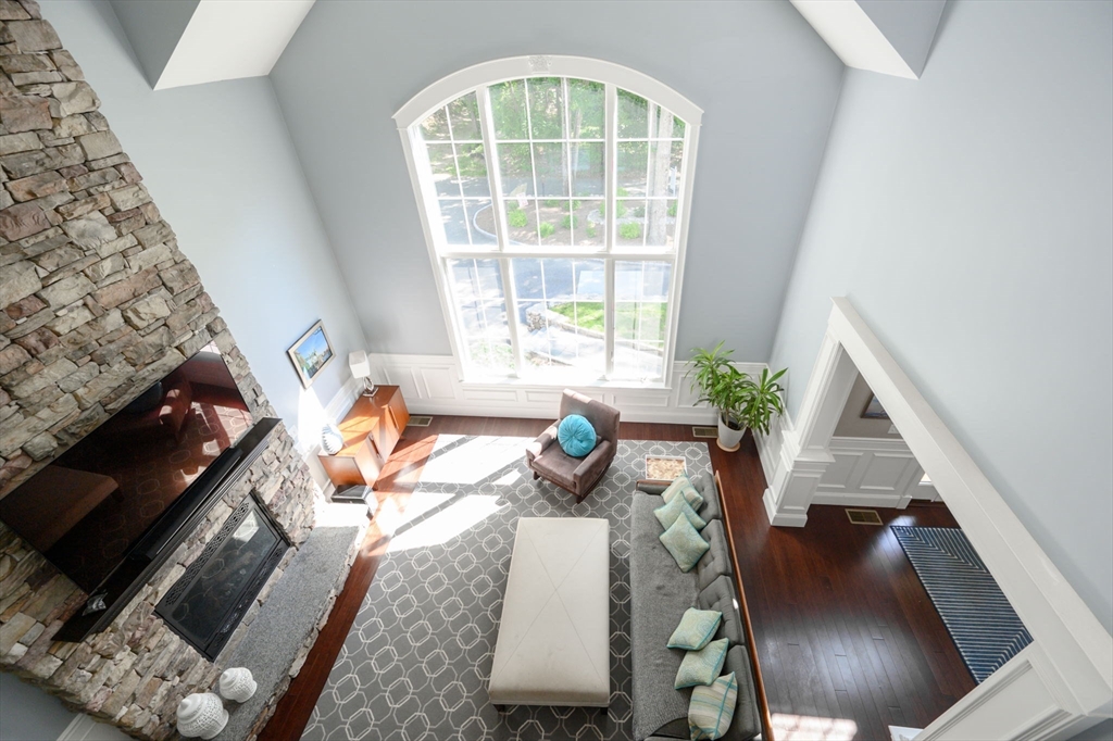 75 Popes Lane Hingham, MA 02043 - Photo 17 of 42 a living room with furniture and a floor to ceiling window