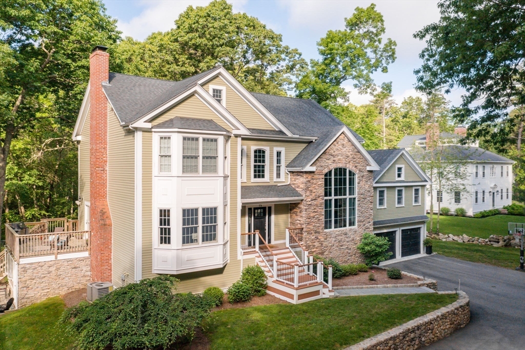 75 Popes Lane Hingham, MA 02043 - Photo 2 of 42 front view of a house with a yard