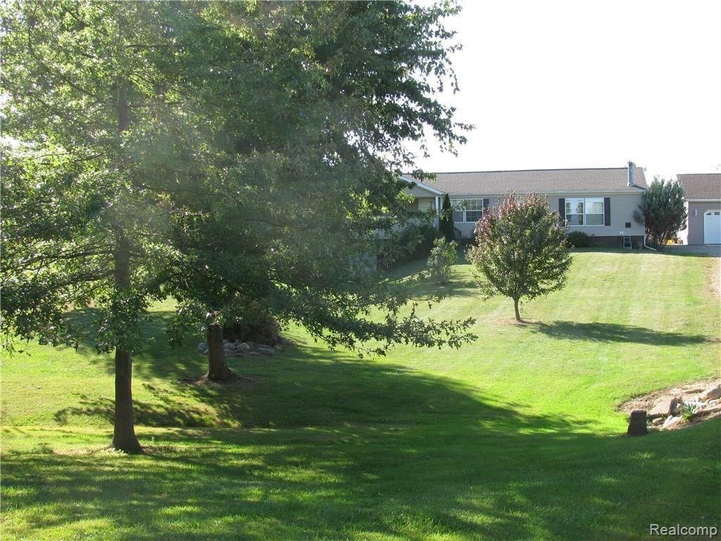 6045 Patrick Road North Branch, MI 48461 - Photo 36 of 44 Beautifully landscaped yard