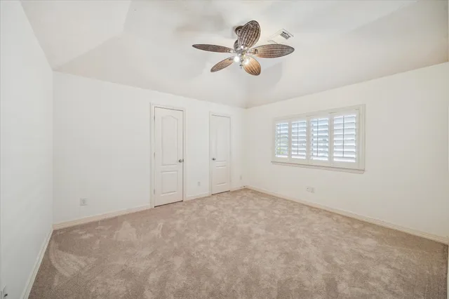 en view of an empty room with a window