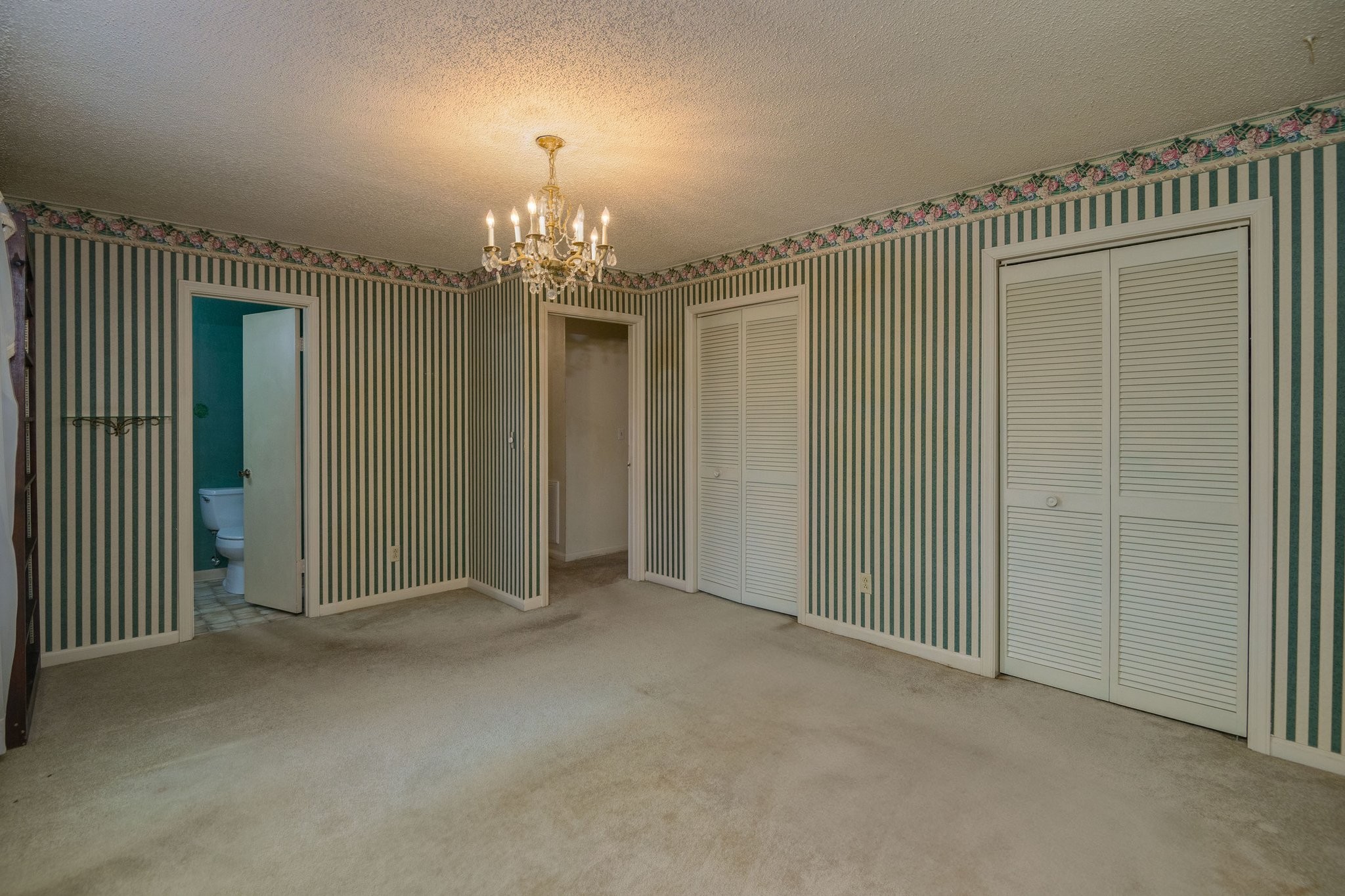 808 Windmere Drive Lebanon, TN 37090 - Photo 44 of 82 an empty room with chandelier fan and windows
