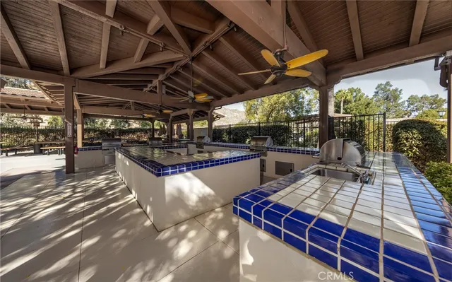 a living room with lots of furniture and a table