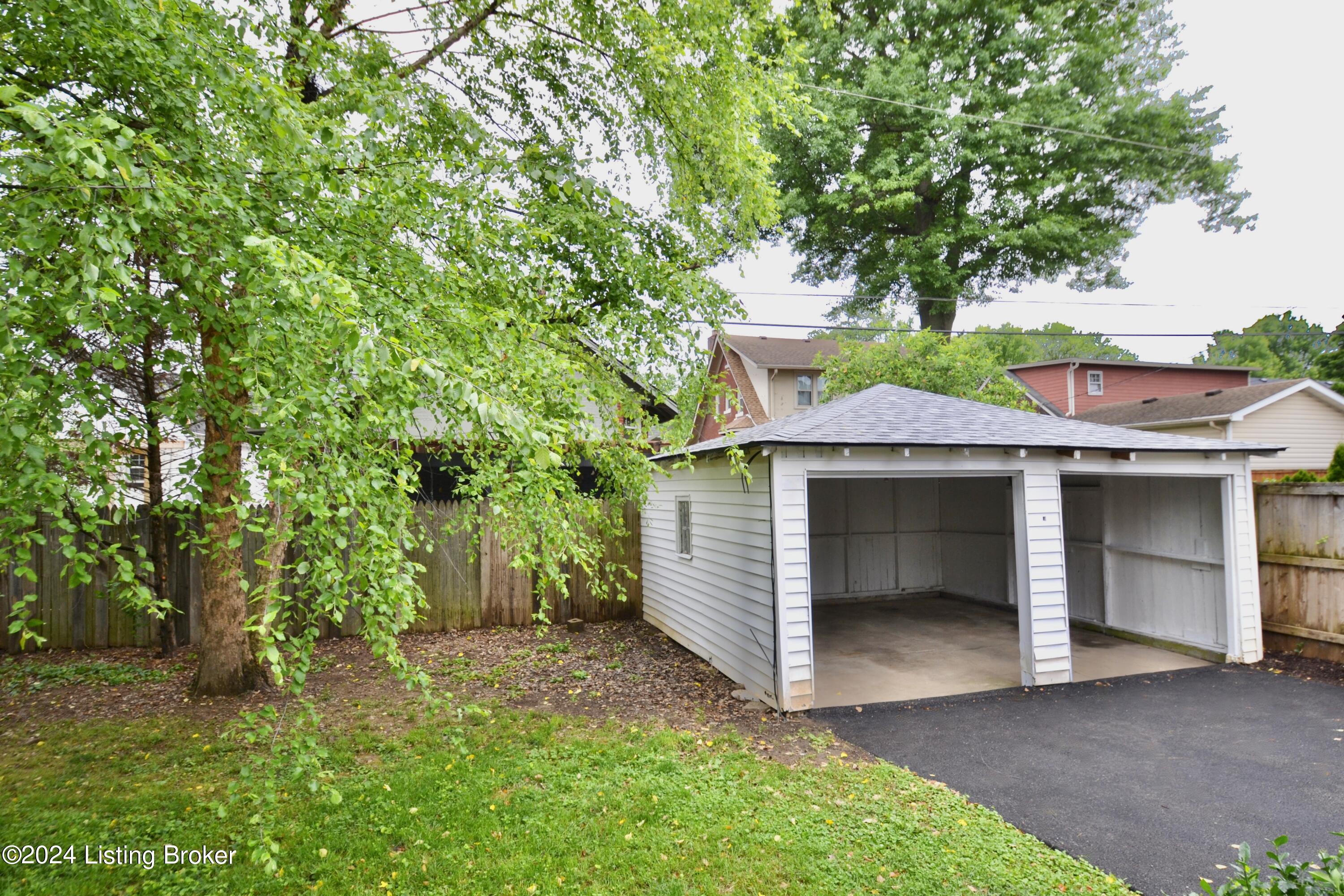 416 Iola Road Louisville, KY 40207 - Photo 30 of 34 Carport is a garage with doors removed
