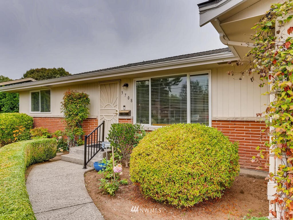 3708 Northeast 10th Street Renton, WA 98056 - Photo 3 of 28 front view of a house with a garden