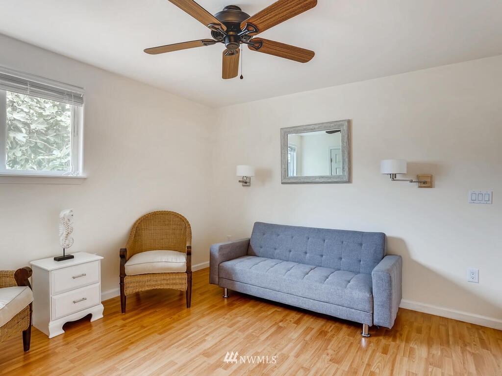3708 Northeast 10th Street Renton, WA 98056 - Photo 22 of 28 a living room with furniture and a wooden floor