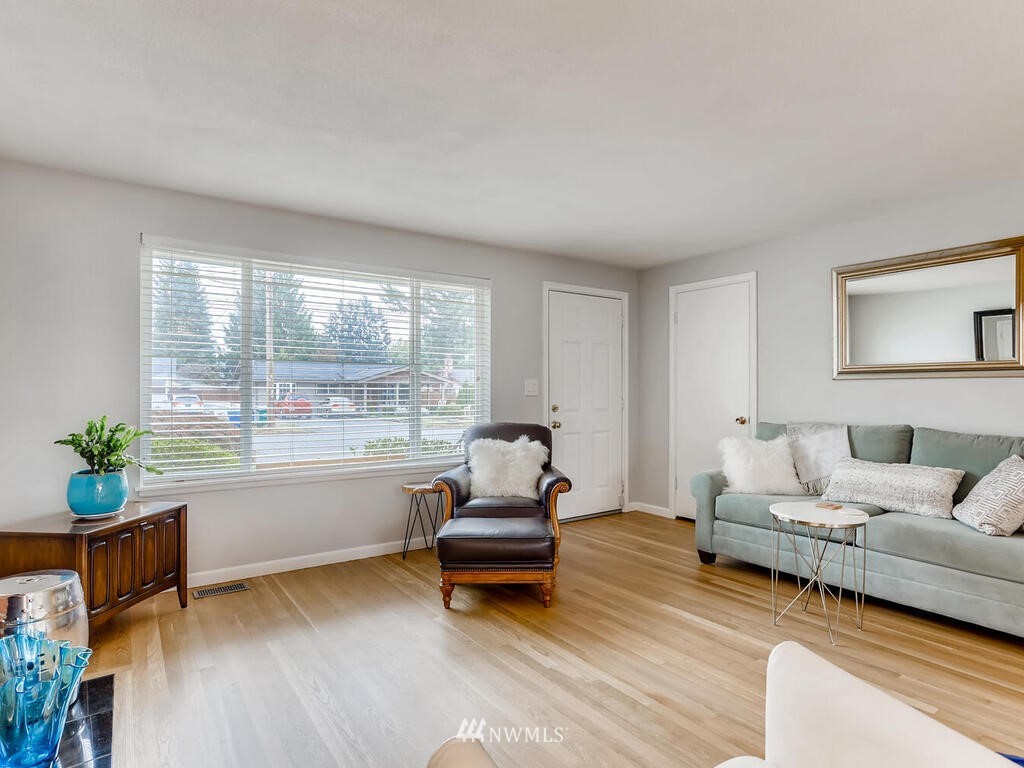 3708 Northeast 10th Street Renton, WA 98056 - Photo 4 of 28 a living room with furniture and a wooden floor