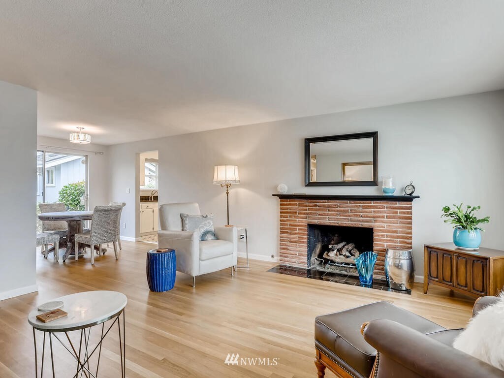 3708 Northeast 10th Street Renton, WA 98056 - Photo 6 of 28 a living room with furniture and a fireplace