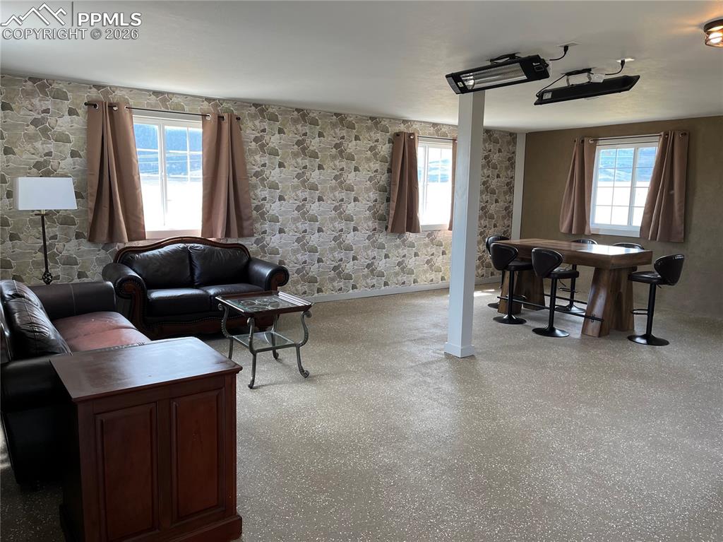 136 Black Knat Road Fairplay, CO 80440 - Photo 23 of 38 a living room with furniture and a window