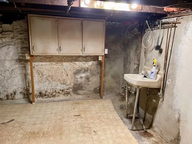 a front view of a house with chairs