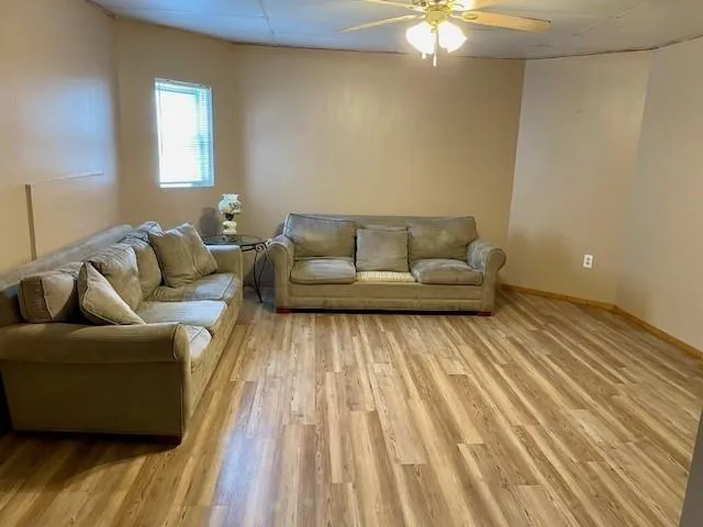 a living room with couches and a coffee table