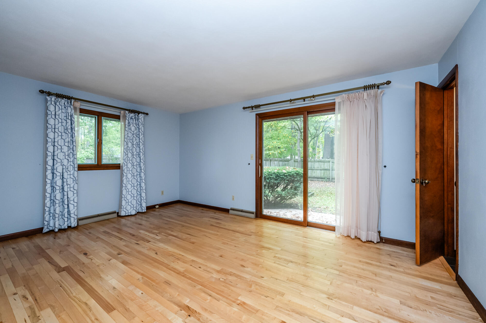 71353 State Line Road Edwardsburg, MI 49112 - Photo 16 of 28 Primary Bedroom w/ Siders to Backyard