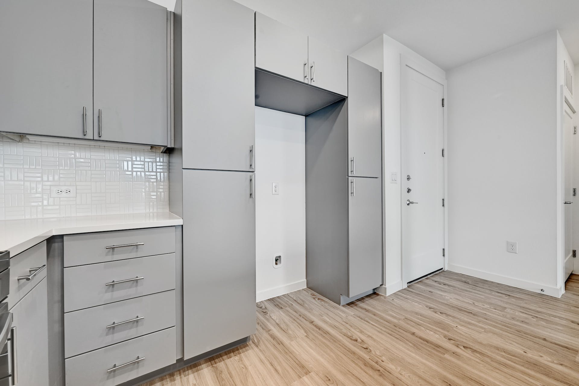 4801 Springdale Road, Unit 1301 Austin, TX 78723 - Photo 5 of 39 Functional kitchen with ample cabinet space and sleek, modern finishes.