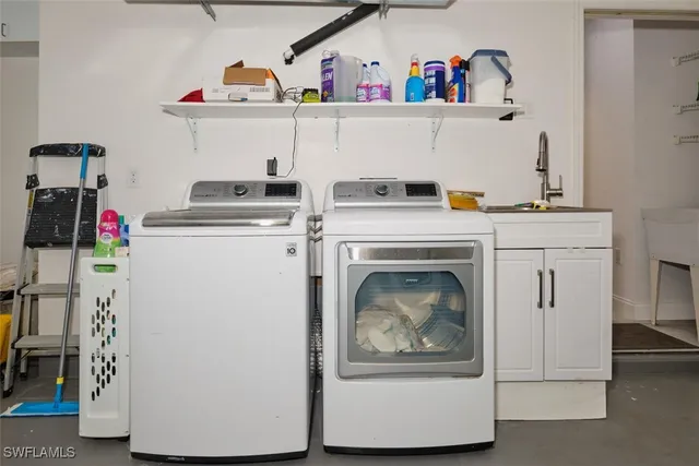 a view of room with window and furniture