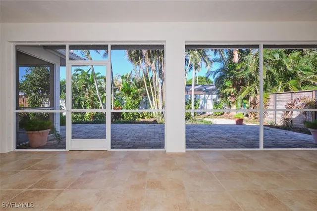 a view of a house with outdoor seating space