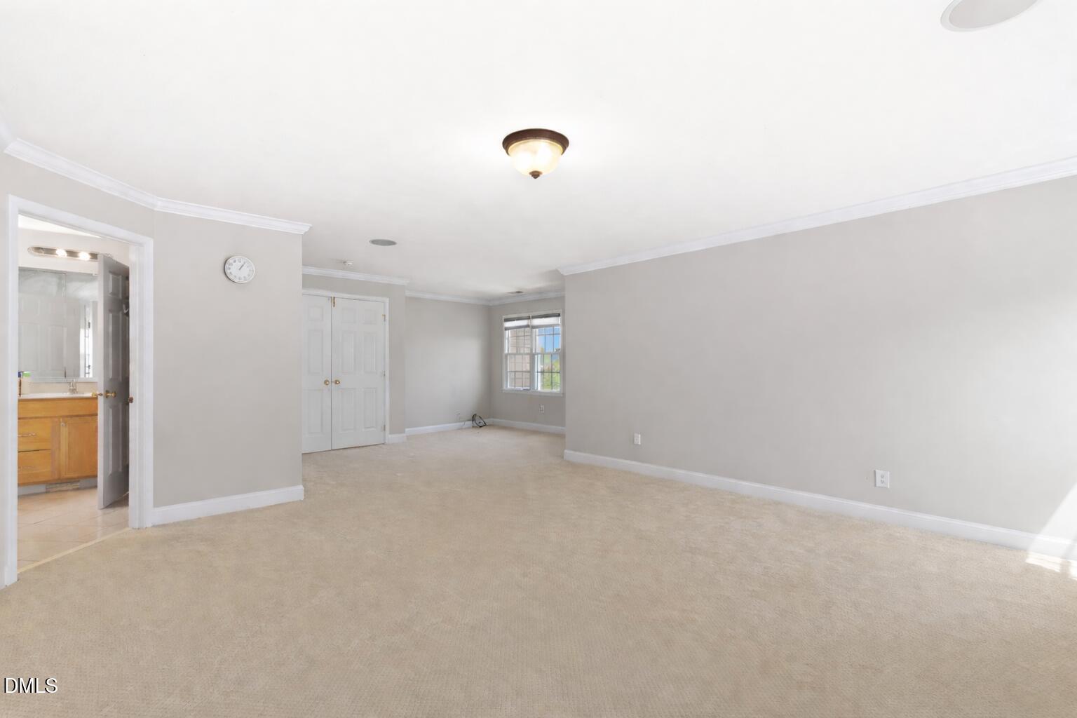 11708 Dellcain Court Raleigh, NC 27617 - Photo 32 of 67 Primary Bedroom