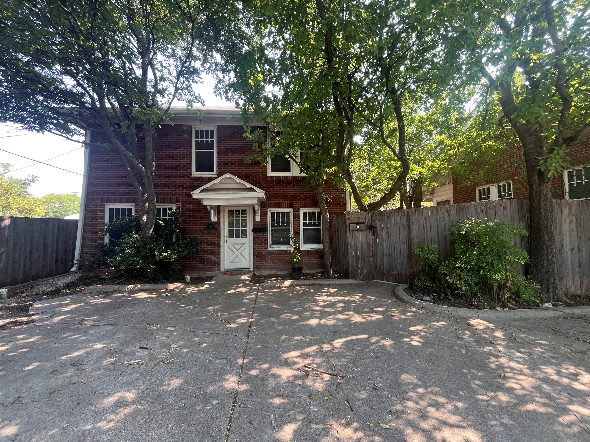 View of front of house featuring brick siding