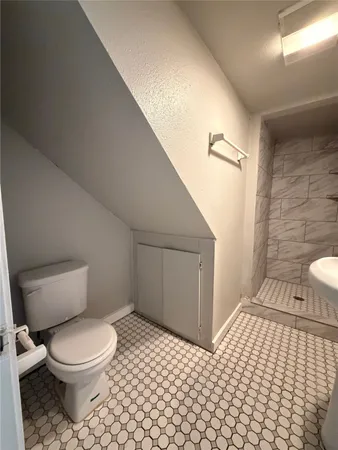 a bathroom with a toilet