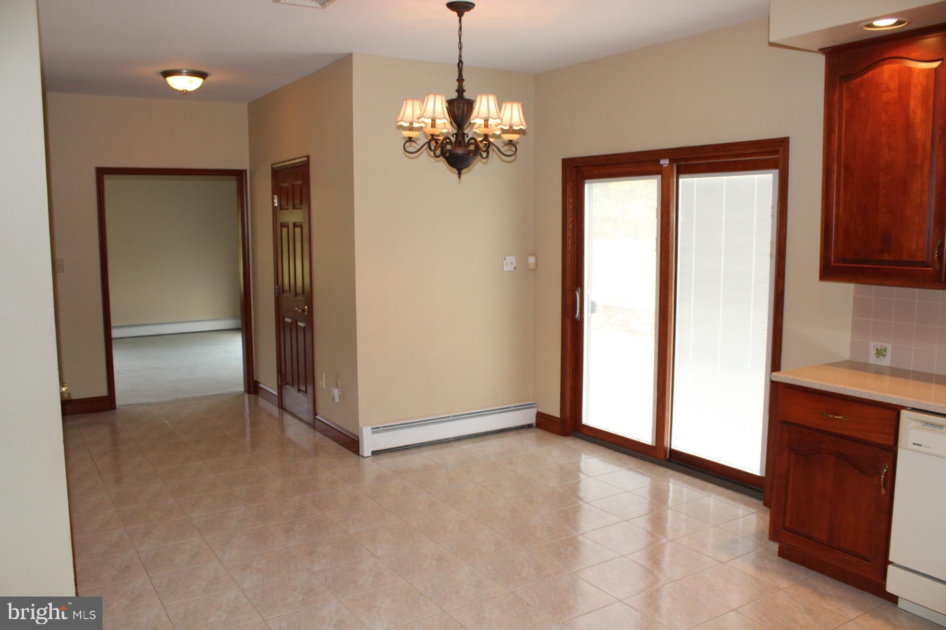 255 Kulps Road Barto, PA 19504 - Photo 26 of 71 Eat-in Kitchen, dining area, slider to patio