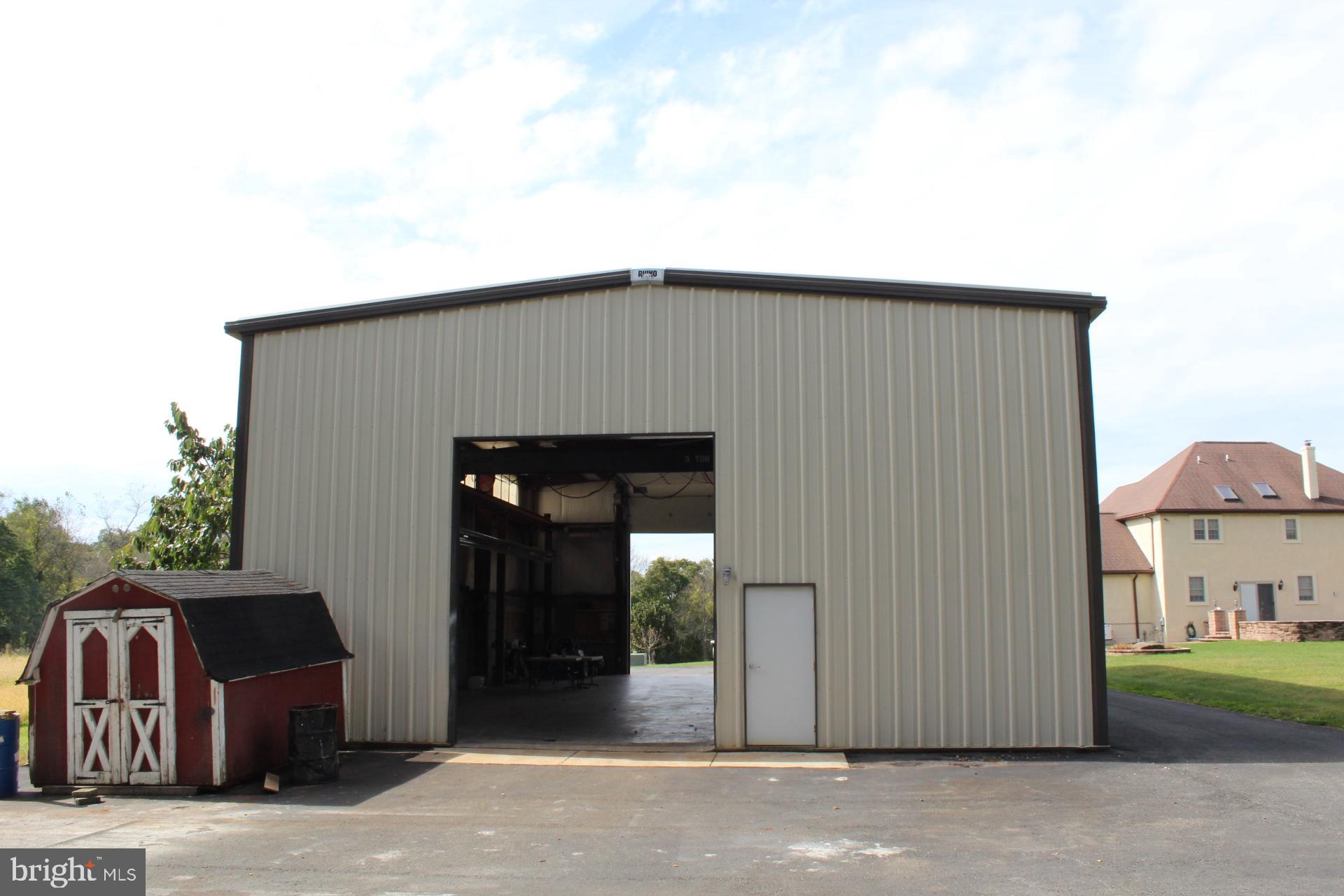255 Kulps Road Barto, PA 19504 - Photo 56 of 71 Garage rear, pass through doors open