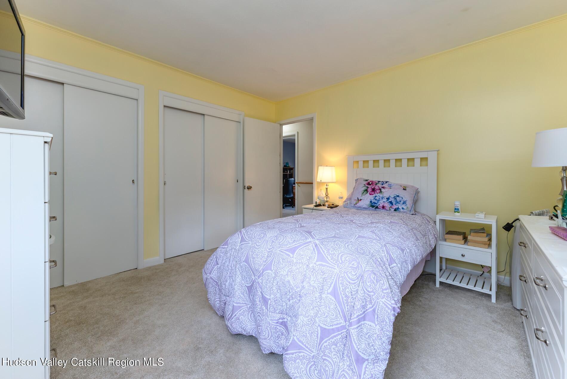 545 Mountain View Avenue Hurley, NY 12443 - Photo 14 of 31 a bedroom with a bed and a window