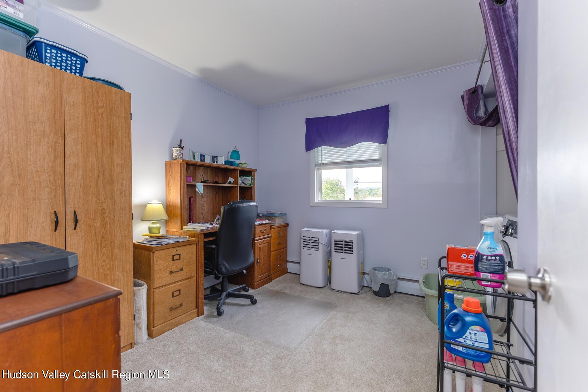 545 Mountain View Avenue Hurley, NY 12443 - Photo 18 of 31 a view of a workspace with furniture and a window