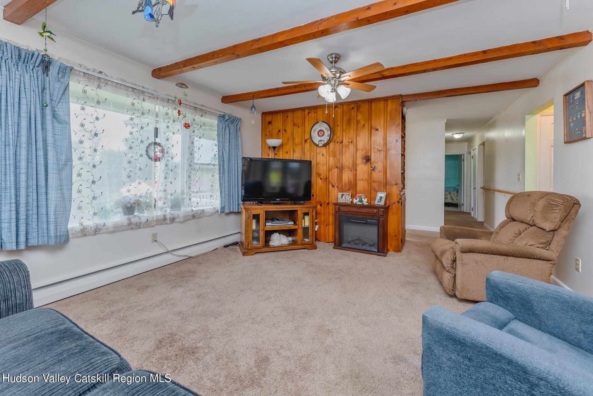 545 Mountain View Avenue Hurley, NY 12443 - Photo 4 of 31 a living room with furniture and a flat screen tv