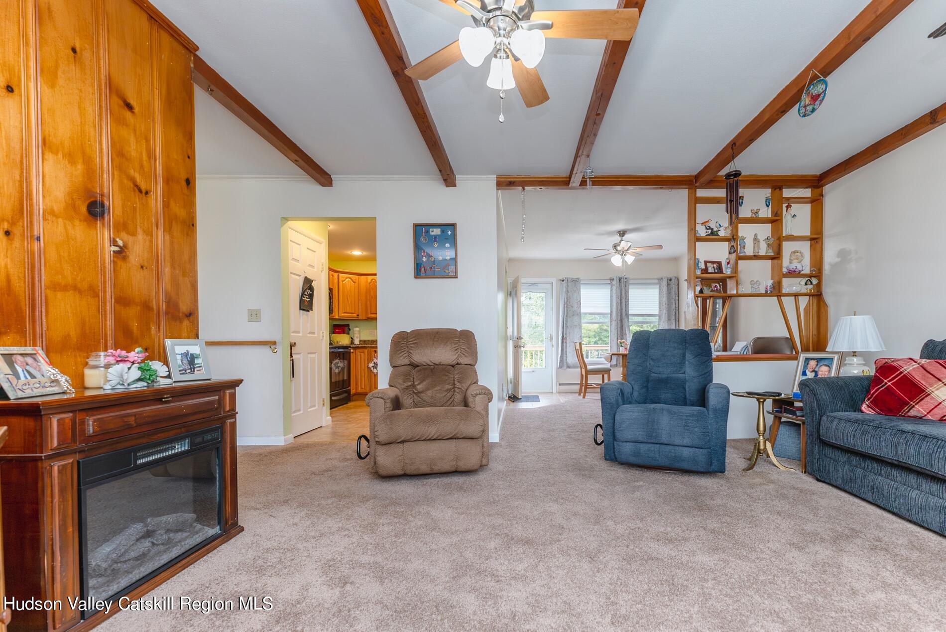 545 Mountain View Avenue Hurley, NY 12443 - Photo 8 of 31 a living room with furniture and a fireplace