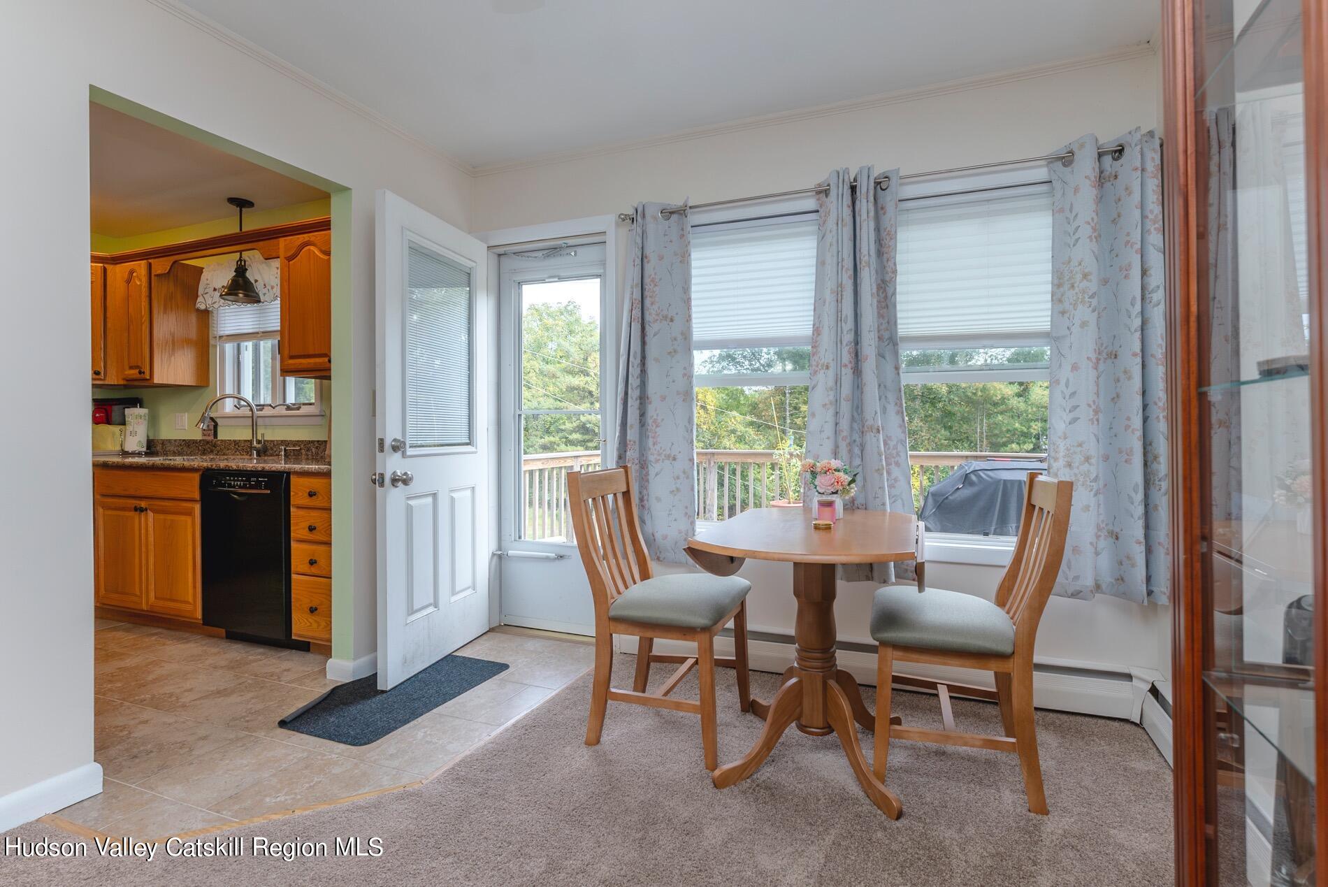 545 Mountain View Avenue Hurley, NY 12443 - Photo 10 of 31 a view of a dining room with furniture and window