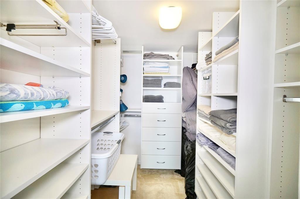 2400 Presidential Way, Unit 502 West Palm Beach, FL 33401 - Photo 14 of 28 a view of walk in closet and bedroom