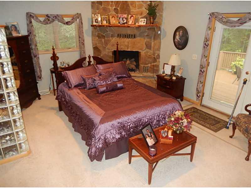 17 Spruce Peak Road Acme, PA 15610 - Photo 11 of 25 Master Bedroom. Unique master suite with walk out to private deck and corner stone fireplace