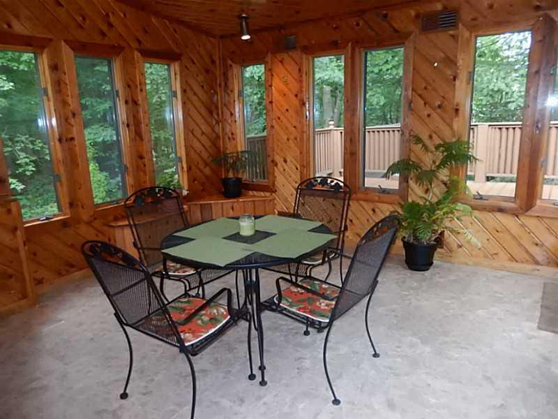 17 Spruce Peak Road Acme, PA 15610 - Photo 18 of 25 Sunroom. Super room to relax in and enjoy the outdoors while inside