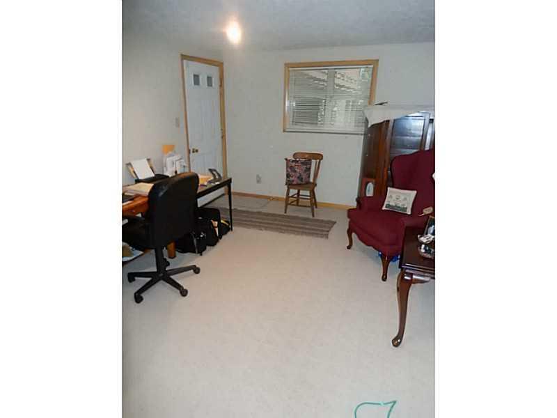 17 Spruce Peak Road Acme, PA 15610 - Photo 19 of 25 Den. Work from home in the office/den.