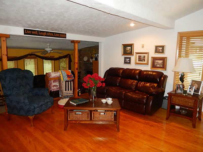 Living Room. Open living room / bar area is great for entertaining and relaxing with friends and family