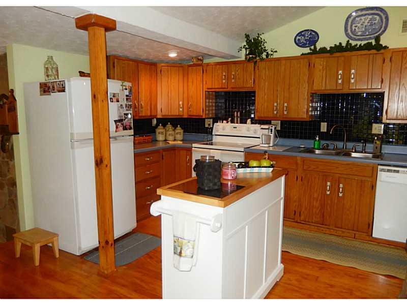 17 Spruce Peak Road Acme, PA 15610 - Photo 8 of 25 Kitchen. Fully equipped kitchen with generous storage space